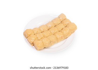 Jock fried chicken for a snack ready to serve in a white plate on a white background.