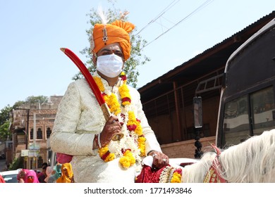 Jodhpur, Rajashtbn, India. 30 June 2020: Indian Groom Wearing Mask Sitting On Horse, People Getting Married After Ease In Lock Down During COVID-19 Pandemic, Wedding During New Strain Coronavirus 