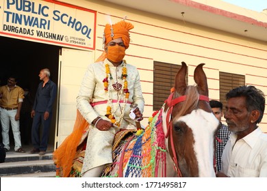 Jodhpur, Rajashtbn, India. 30 June 2020: Indian Groom Wearing Mask Sitting On Horse, People Getting Married After Ease In Lock Down During COVID-19 Pandemic, Wedding During Coronavirus Outbreak