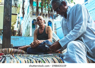 Jodhpur, Rajasthan, India - April14, 2015: Two Elderly Men Playing Cards In The Street 