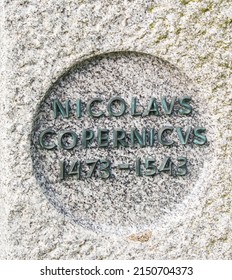 Jodrell Bank Observatory, CreweUK - February 26 2022: Stone Monument Engraved With Nicolaus Copernicus And Year Of Birth And Death