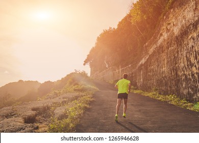 Jogging On A Uphill / Downhill Remote Road.