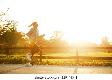 Jogging Woman Running In Park