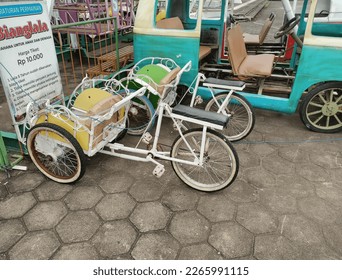 Jogja - Febeuary 23,2023 : Mini rickshaws are often found in Jogja - Shutterstock ID 2265991115
