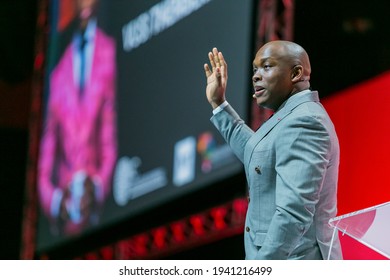 JOHANNES, SOUTH AFRICA - Mar 11, 2021: Johannesburg, South Africa - August 21, 2018: Entrepreneur and speaker Vusi Thembekwayo live on stage at Think Sales Convention
