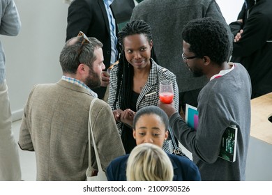 JOHANNESB, SOUTH AFRICA - Aug 13, 2021: A group of young people mingling and chatting at a media event