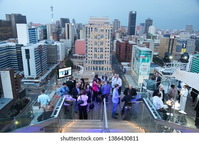 Johannesburg Gauteng South Africa 02 07 2011 Rooftop Party With City Scape At Back At Sunset 