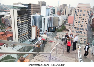 Johannesburg Gauteng South Africa 02 07 2011 Rooftop Party With City Scape At Back At Sunset 