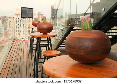 Johannesburg Gauteng South Africa 02072011 Decor With Protea Flower Formal Setting Gala Dinner Party Year End Wedding Round Wood And Glass Vase Close Up Outdoor