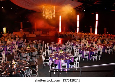 Johannesburg Gauteng South Africa 06092010 Table Setting Decoration At A Gala Dinner Corporate Formal Event Banquet With White Flowers Smoke And Chandelier