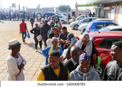 Johannesburg Gauteng South Africa 07 30 2019 Customers In A Row Waiting On Store To Open Covid-19 Corona Virus Pandemic Township Food Shortage Panic Buy