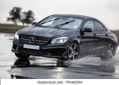 Johannesburg, Gauteng, South Africa, 20018/01/10.
Sports Car Skidding On Water. Advanced Driver Training.