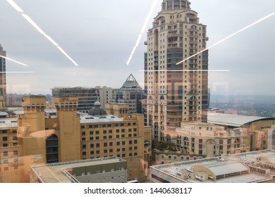 Johannesburg, Gauteng South Africa June 26 2019 Sandton City Scape Through Glass From High Above