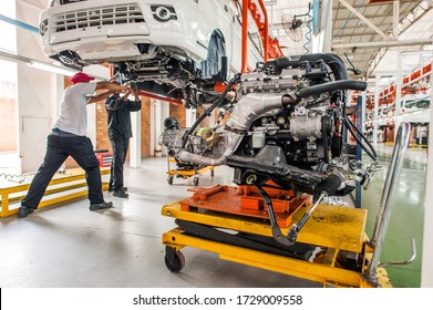 Johannesburg, Gauteng / South Africa - June 25, 2016: Motor Vehicle Technician Installs New Car Part At A Vehicle Assembly Plant 