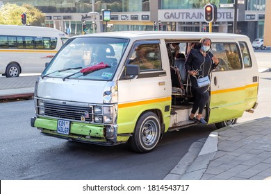 Johannesburg, South Africa, 11th September - 2020: Passenger Getting Out Of Mini Bus Taxi In City Centre.