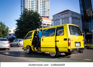 Johannesburg, South Africa, 28 November - 2018: Passenger Getting Out Of Mini Bus Taxi.