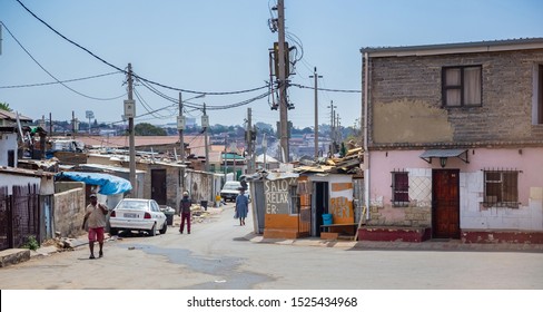 Johannesburg, South Africa , 4 October - 2019: Township Street With Tin Shacks And Small Houses