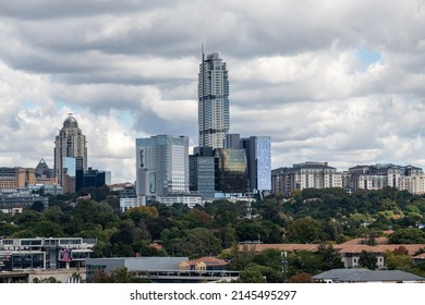 Johannesburg, South Africa - April 13, 2022 - View Of Sandton City Skylines, The Leonardo Building, The Marc Mall And Momentum Building