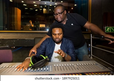 Johannesburg, South Africa - April 28, 2015: Nigerian Music Producer Cobhams Asuquo Working In Studio With African Artists