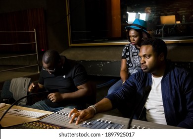 Johannesburg, South Africa - April 28, 2015: Nigerian Music Producer Cobhams Asuquo Working In Studio With African Artists