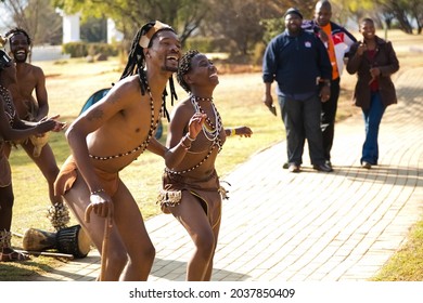 JOHANNESBURG, SOUTH AFRICA - Aug 11, 2021: Traditional African Dancers Performing In Tribal Clothing And Adornments In Johannesburg