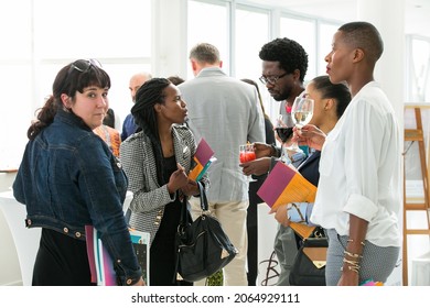 JOHANNESBURG, SOUTH AFRICA - Aug 13, 2021: Many young people mingling and chatting at an event