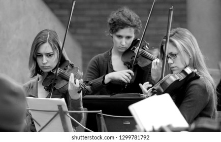 Johannesburg, South Africa - August 28 2010: Diverse youth at music school orchestra