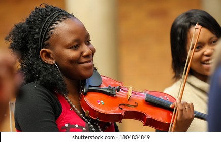 Johannesburg, South Africa - August 28 2010: Diverse Youth At Music School Orchestra