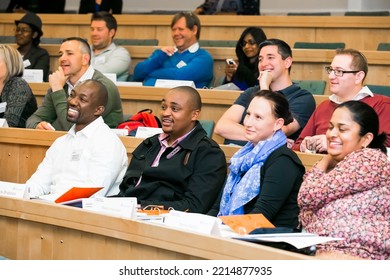 Johannesburg, South Africa - August 31, 2014: Diverse Students Attending A Lecture In College Auditorium