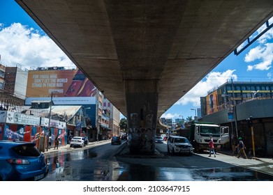 Johannesburg, South Africa - December 29, 2021: Concrete Highway Above City Street Midday Johannesburg City