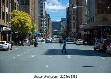 Johannesburg, South Africa - December 29, 2021: Looking Down A Typical Street In The City Midday Johannesburg Cbd