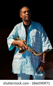 Johannesburg, South Africa - February 18, 2014: African Artist Femi Kuti, Nigeria Posing For A Photo With A Saxophone