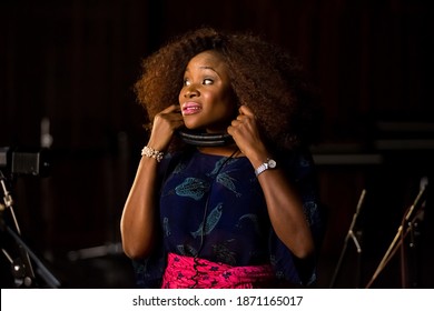 Johannesburg, South Africa - February 18, 2014: African Artist Omawumi, Nigeria Singing In A SABC Recording Studio