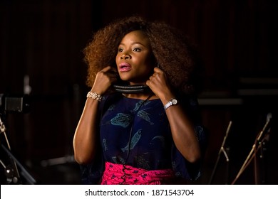 Johannesburg, South Africa - February 18, 2014: African Artist Omawumi, Nigeria Singing In A SABC Recording Studio