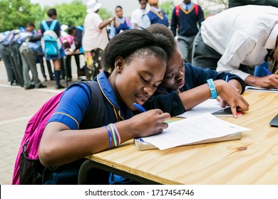 Johannesburg, South Africa - January 15, 2015: Young African Primary School Children Writing 