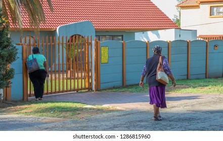 Johannesburg, South Africa - January 16, 2019: Unidentified Black Women Domestic Workers On Their Way To Work At Residential Homes In The City