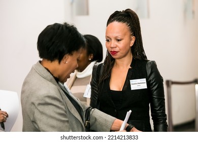 Johannesburg, South Africa - July 14, 2014: Diverse Woman Networking At Corporate Convention Event