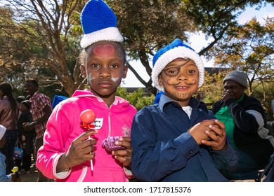 Johannesburg, South Africa - July 18, 2014: Young African Preschool Kids With Face Paint On The Playground 