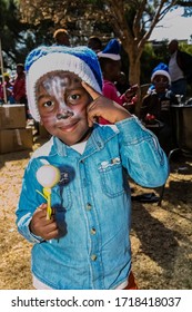 Johannesburg, South Africa - July 18, 2014: Young African Preschool Kids With Face Paint On The Playground 