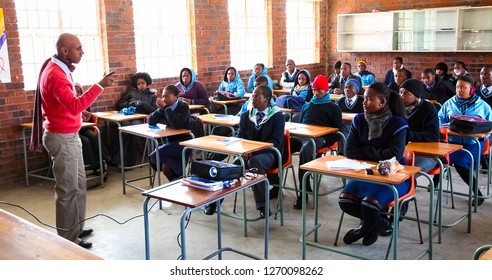 Johannesburg, South Africa - July 29 2011: African High School Children And Teacher In Classroom Lesson