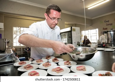 Johannesburg, South Africa - June 7, 2014: Chef Dishing Up Food At Cooking Class For Beer And Food Pairing