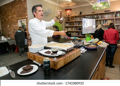 Johannesburg, South Africa - June 7, 2014: Chef Demonstrating Techniques At Cooking Class For Beer And Food Pairing