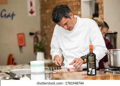 Johannesburg, South Africa - June 7, 2014: Chef Preparing Ingredients At Cooking Class For Beer And Food Pairing