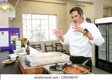 Johannesburg, South Africa - June 7, 2014: Chef Demonstrating Techniques At Cooking Class For Beer And Food Pairing