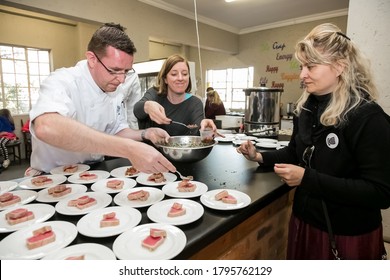 Johannesburg, South Africa - June 7, 2014: Chef Plating Up Food At Cooking Class For Beer And Food Pairing