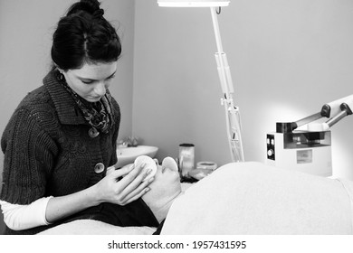 JOHANNESBURG, SOUTH AFRICA - Mar 13, 2021: Johannesburg, South Africa - June 12 2013: Beauty Therapist Doing A Facial Procedure In A Day Spa