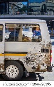 Johannesburg, South Africa - March 8, 2018: Minibus Taxi With Passenger Seen Through Window.