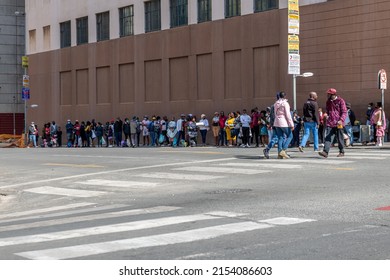 Johannesburg, South Africa - May 07, 2022 - People Waiting In Line For The Public Transport Bus In Johannesburg Central Business District 