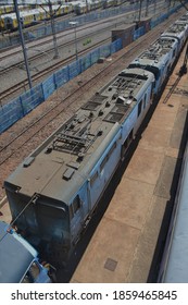 Johannesburg, South Africa - November 02, 2020: Looking Down On A Blue Train Ready For Maintenance Midday Braamfontein