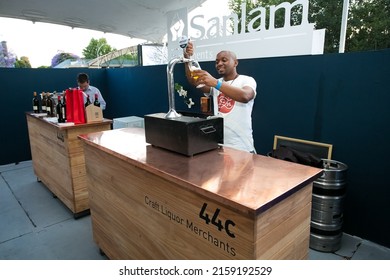 JOHANNESBURG, SOUTH AFRICA - Oct 19, 2021: A Barman Pouring A Drink At A VIP Lounge In Johannesburg, South Africa